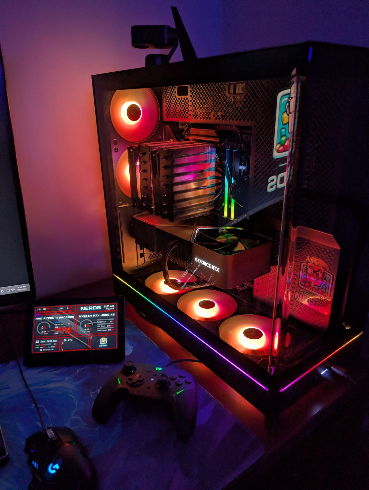 Clear glass panel custom PC build showing GeForce RTX graphics card and white fans