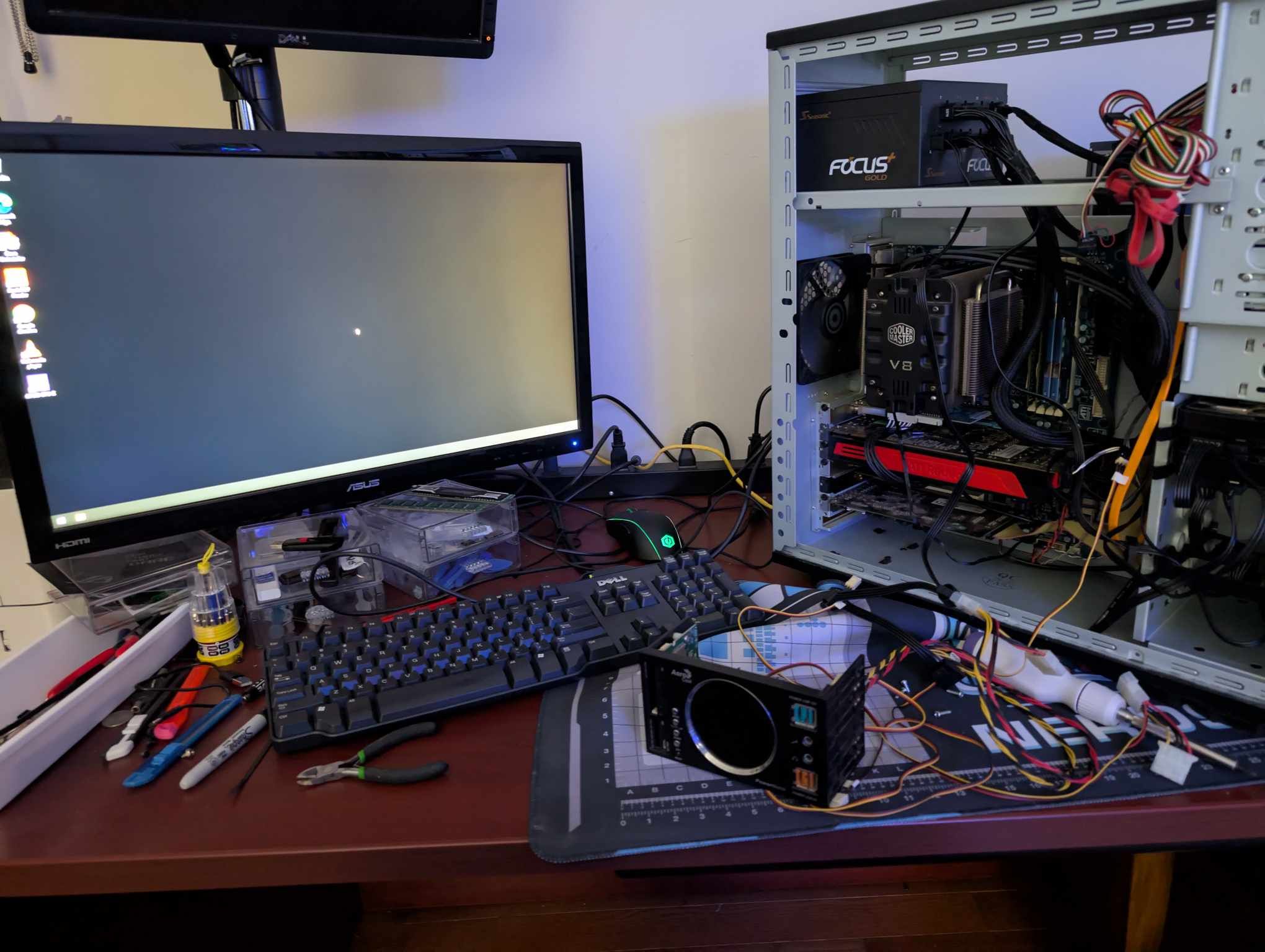 White Montech case custom PC build with Radeon graphics card and blue RGB lighting